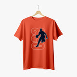 An orange crew neck t-shirt with a graphic print of a basketball player on the front.