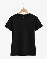 A plain black short-sleeve Suvin Gold cotton crewneck t-shirt hanging on a wooden hanger against a light gray background.