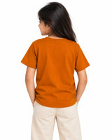 Back view of girl wearing Rustic Bronze Suvin Gold cotton T-shirt for kids side