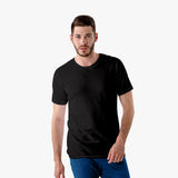 A man wearing a plain black short-sleeve crew neck t-shirt.