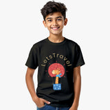 black cotton kids T-shirt for boys with giraffe in hot-air-balloon graphic and “Let’s Travel” text with model