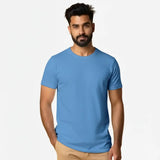 Man wearing a blue Suvin Gold t-shirt