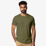 Man wearing an olive green t-shirt on a white background