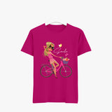 Pink t-shirt with a graphic of a woman riding a bicycle and the word 'Smile' on a white background