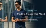 Man wearing a Supima Cotton navy blue t-shirt with promotional text about luxury tees.