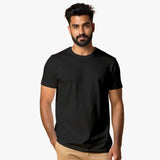Man wearing a Suvin Gold Cotton  black t-shirt 