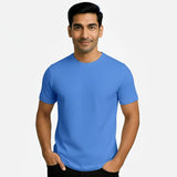 Man wearing a supima cotton blue t-shirt 