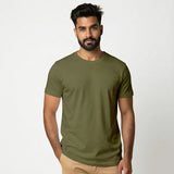 Man wearing an Suvin Gold Cotton olive green t-shirt on a white background