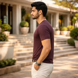 Man in a maroon Suvin gold cotton luxury cotton t-shirt for men premium mens wear 