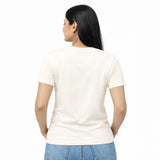 Woman wearing a plain off white suvin gold cotton  t-shirt 